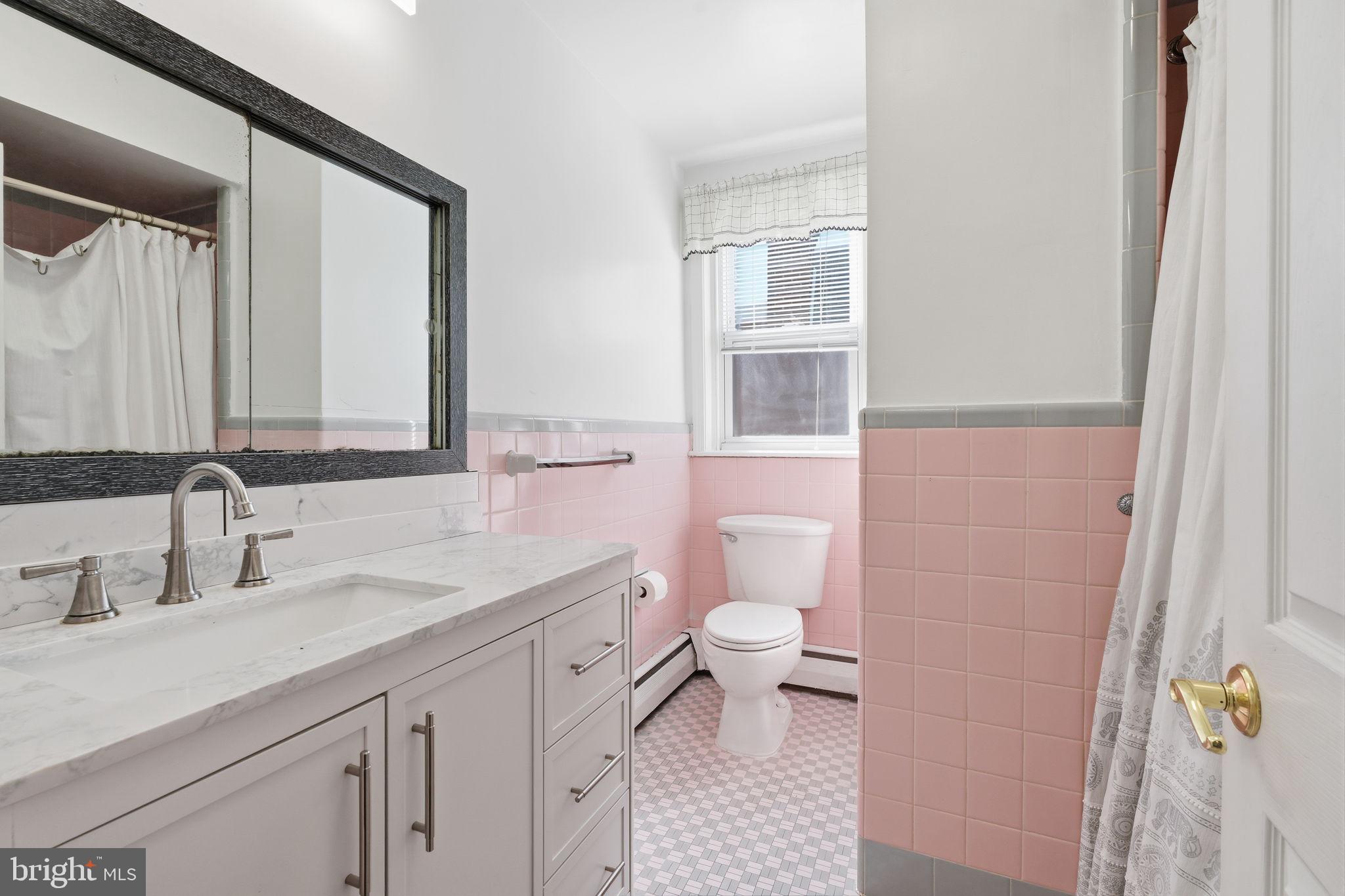 1025 Friendship Street Philadelphia, PA 19111 - Photo 21 of 36 Charming pastel-hued bathroom retreat.