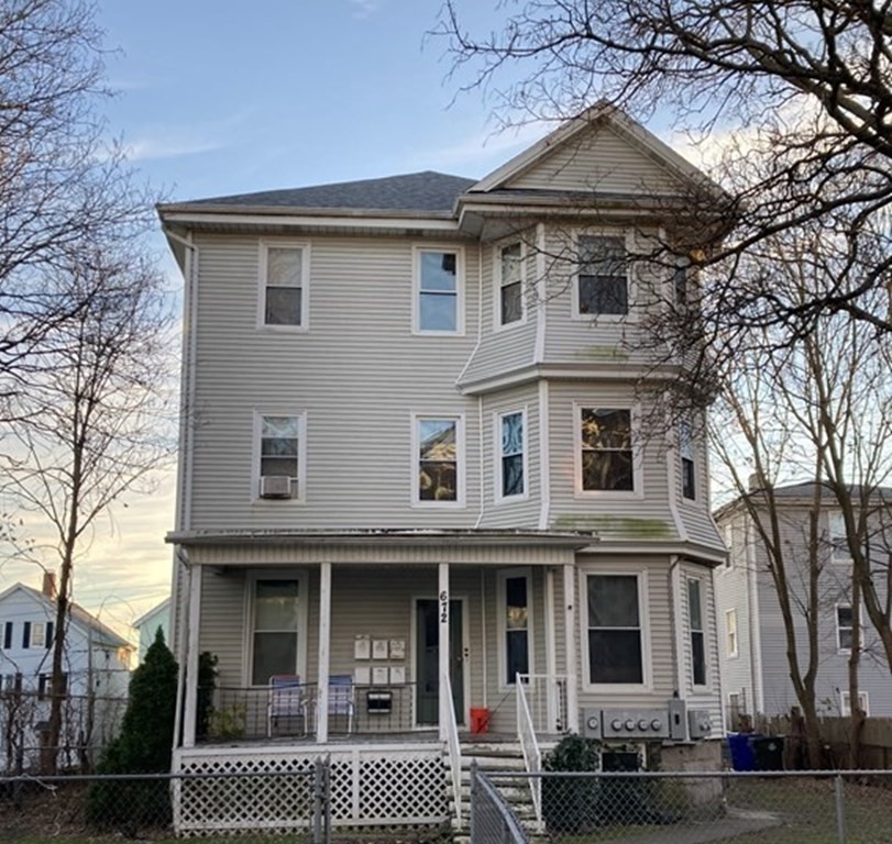 672 2nd Street Fall River, MA 02721 - Photo 1 of 16 a front view of a house with a yard