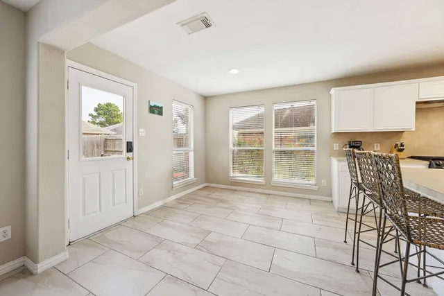 a view of a livingroom with furniture window and outside view
