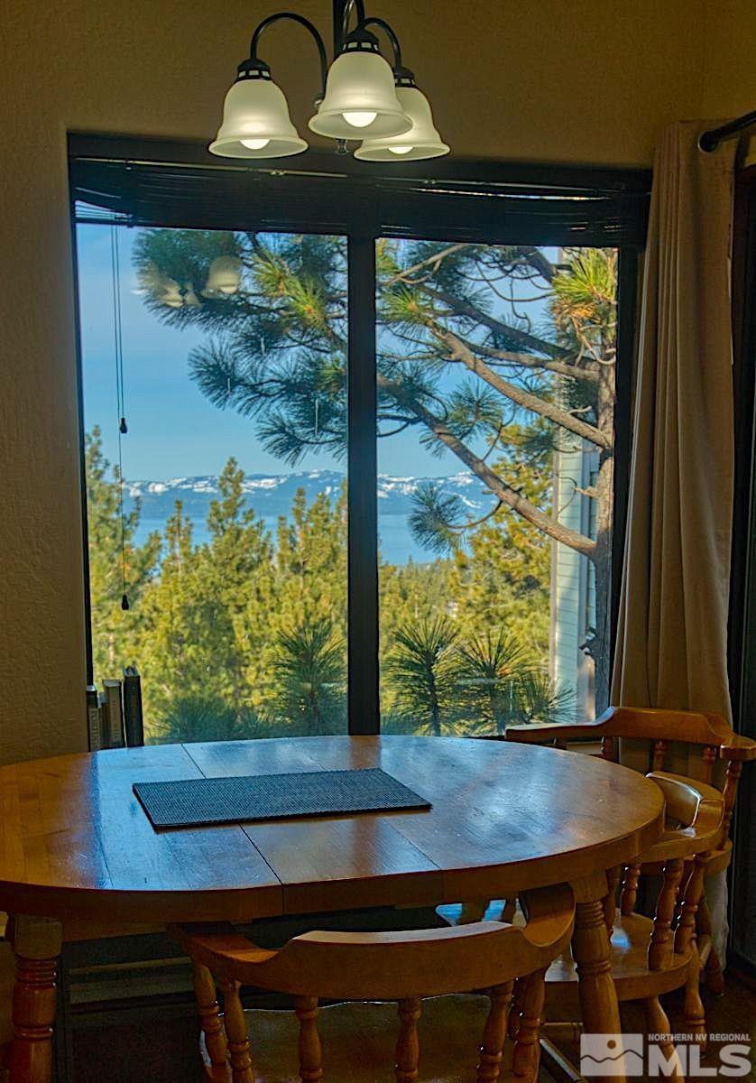 313 Tramway Drive, Unit 26 Stateline, NV 89449 - Photo 2 of 19 a view of a room with a large window
