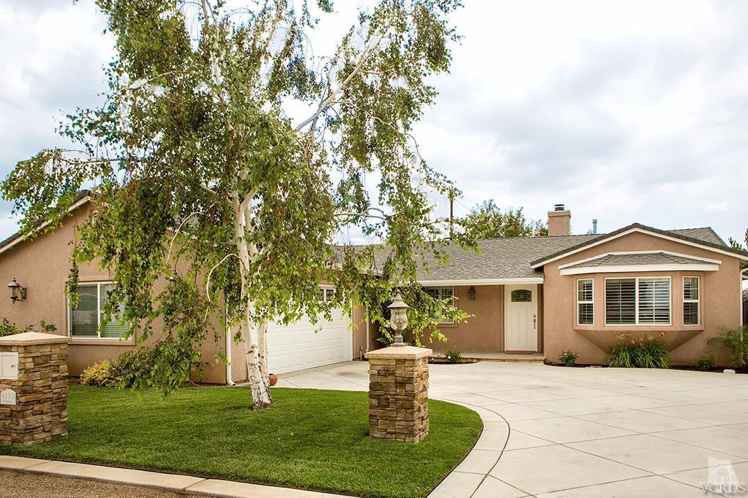 4113 Eve Road Simi Valley, CA 93063 - Photo 3 of 31 a front view of a house with a yard