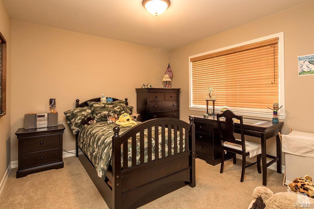 4113 Eve Road Simi Valley, CA 93063 - Photo 22 of 31 a bedroom with a bed and a desk