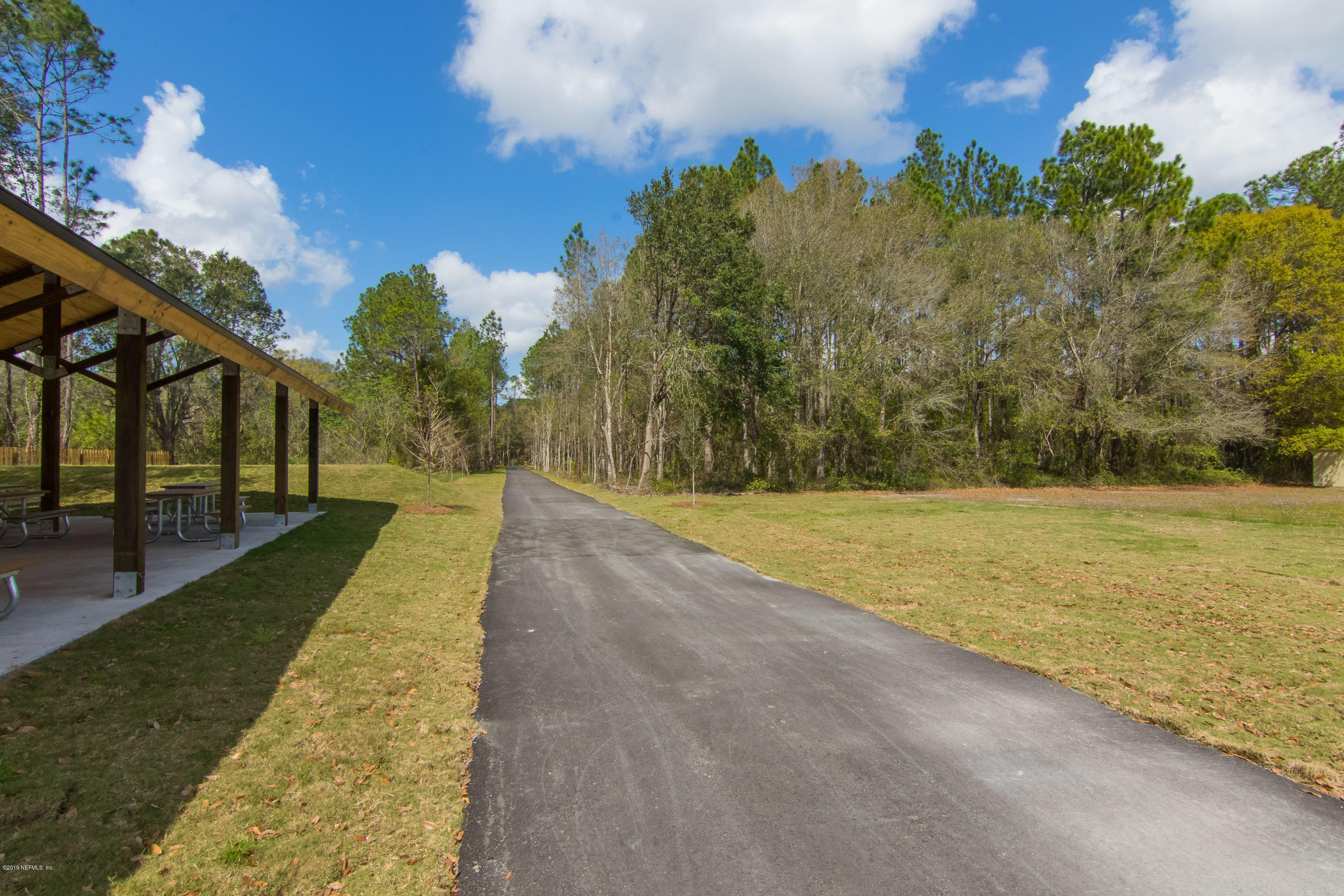 6345 Armstrong Road Elkton, FL 32033 - Photo 22 of 26 a view of swimming pool with an outdoor seating