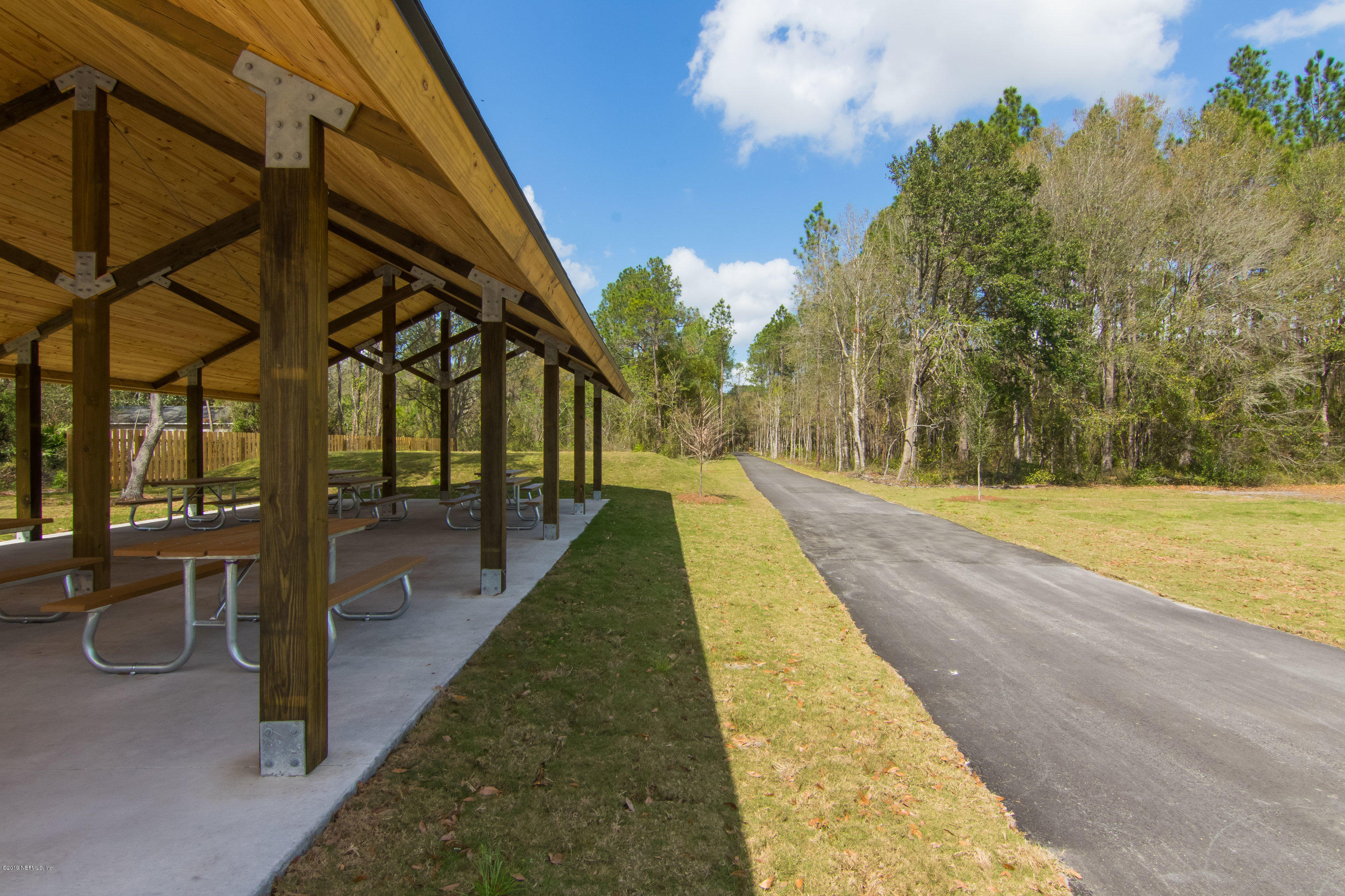 6345 Armstrong Road Elkton, FL 32033 - Photo 24 of 26 a view of swimming pool with an outdoor seating