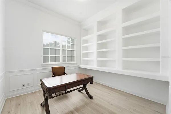 a view of a workspace with furniture