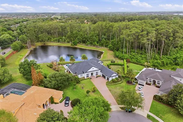 an aerial view of a house with a garden