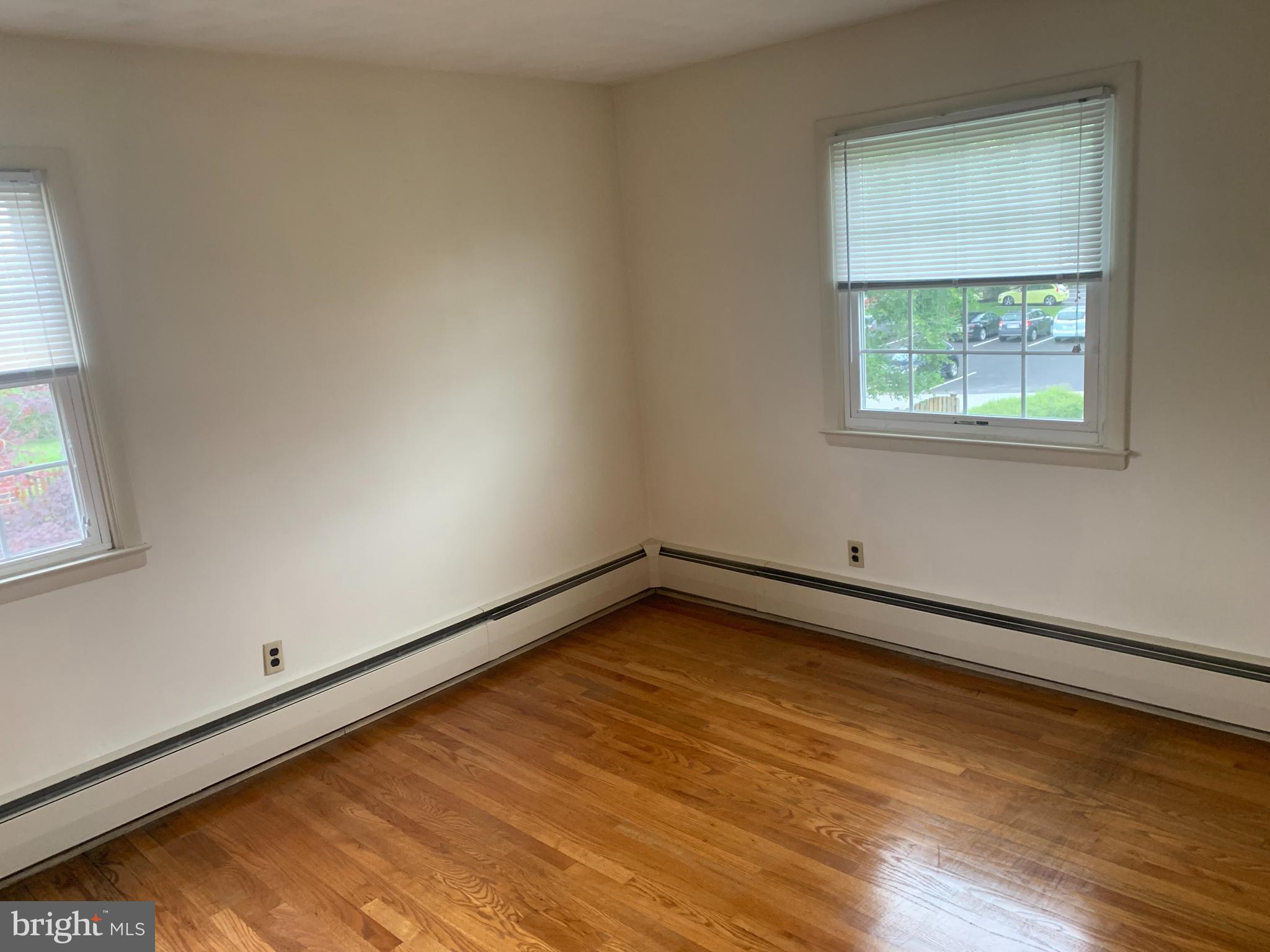 1462 Wayne Avenue York, PA 17403 - Photo 14 of 18 a view of a room with wooden floor and window