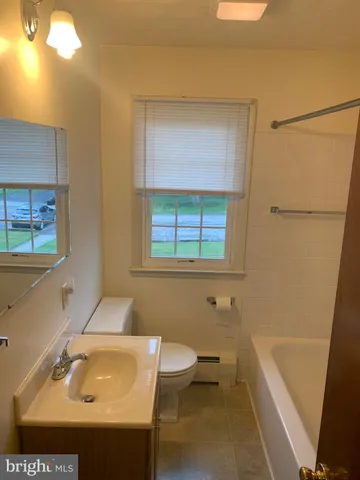 a bathroom with a sink and a tub
