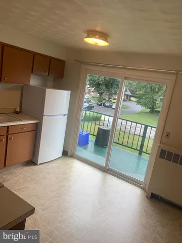 a view of a room with a large window