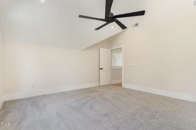 a view of room with window and front door