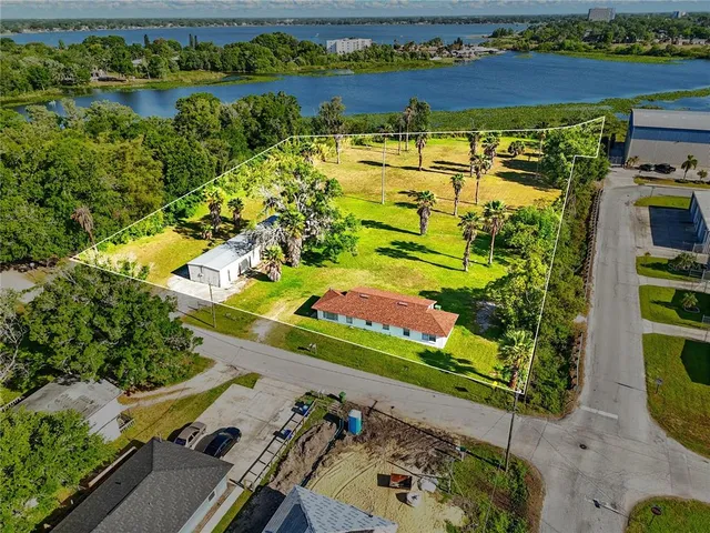 an aerial view of a building with outdoor area