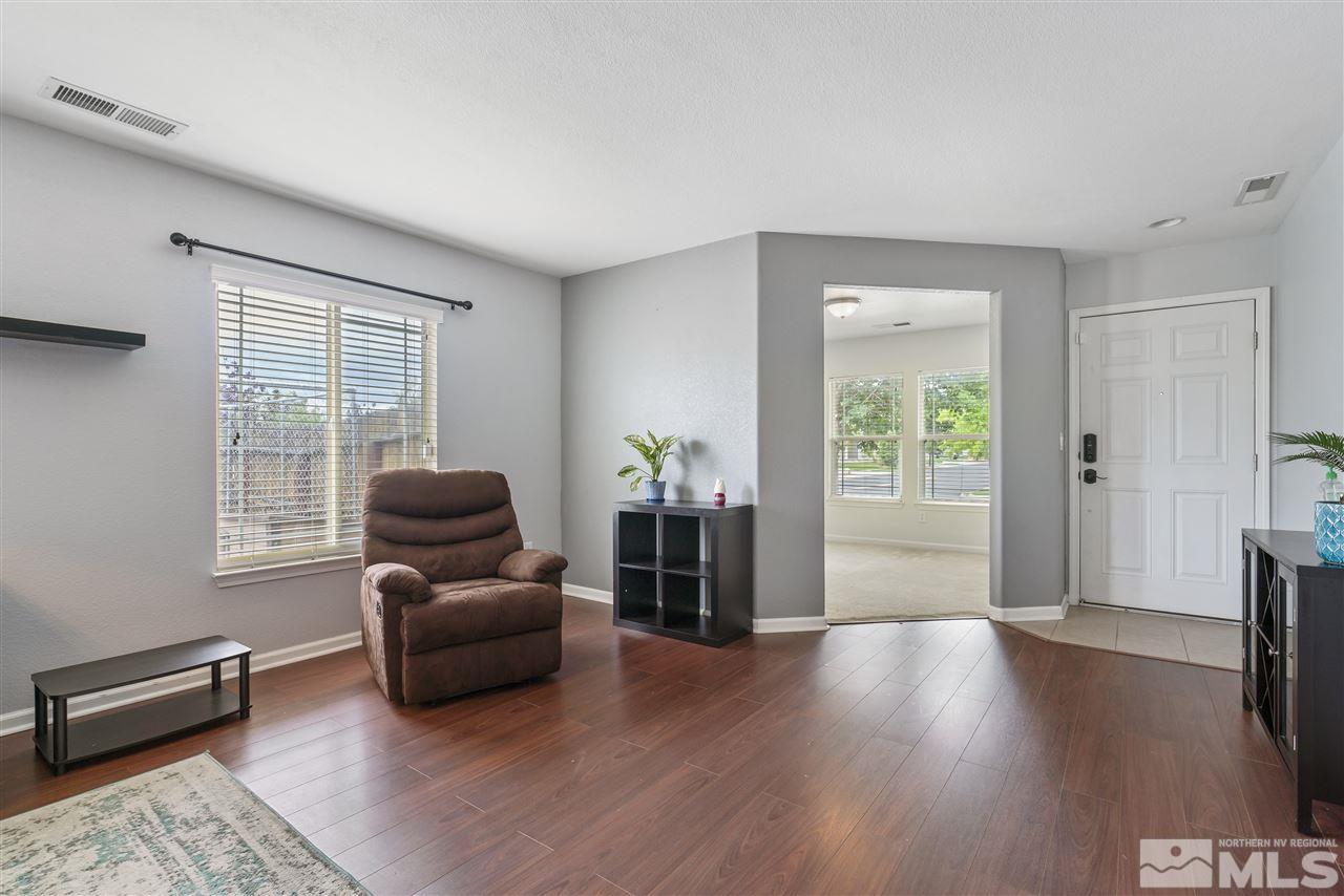 9032 Gilvarry Street Reno, NV 89506 - Photo 3 of 14 a living room with furniture and a window