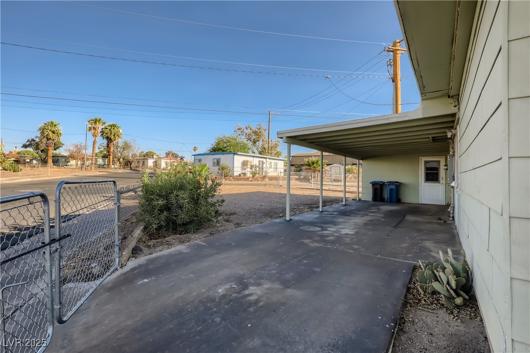 103 West Victory Road Henderson, NV 89015 - Photo 28 of 28 View of parking with a carport