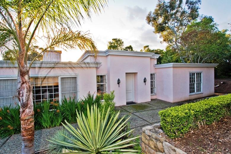 2296 Las Tunas Road Santa Barbara, CA 93103 - Photo 2 of 13 a front view of a house with a garden