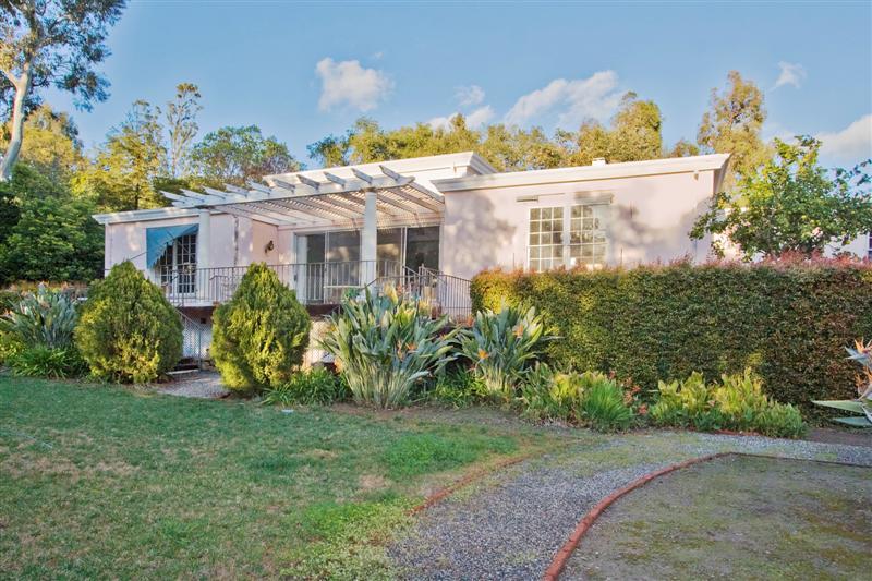 2296 Las Tunas Road Santa Barbara, CA 93103 - Photo 10 of 13 a view of a house with a yard and potted plants