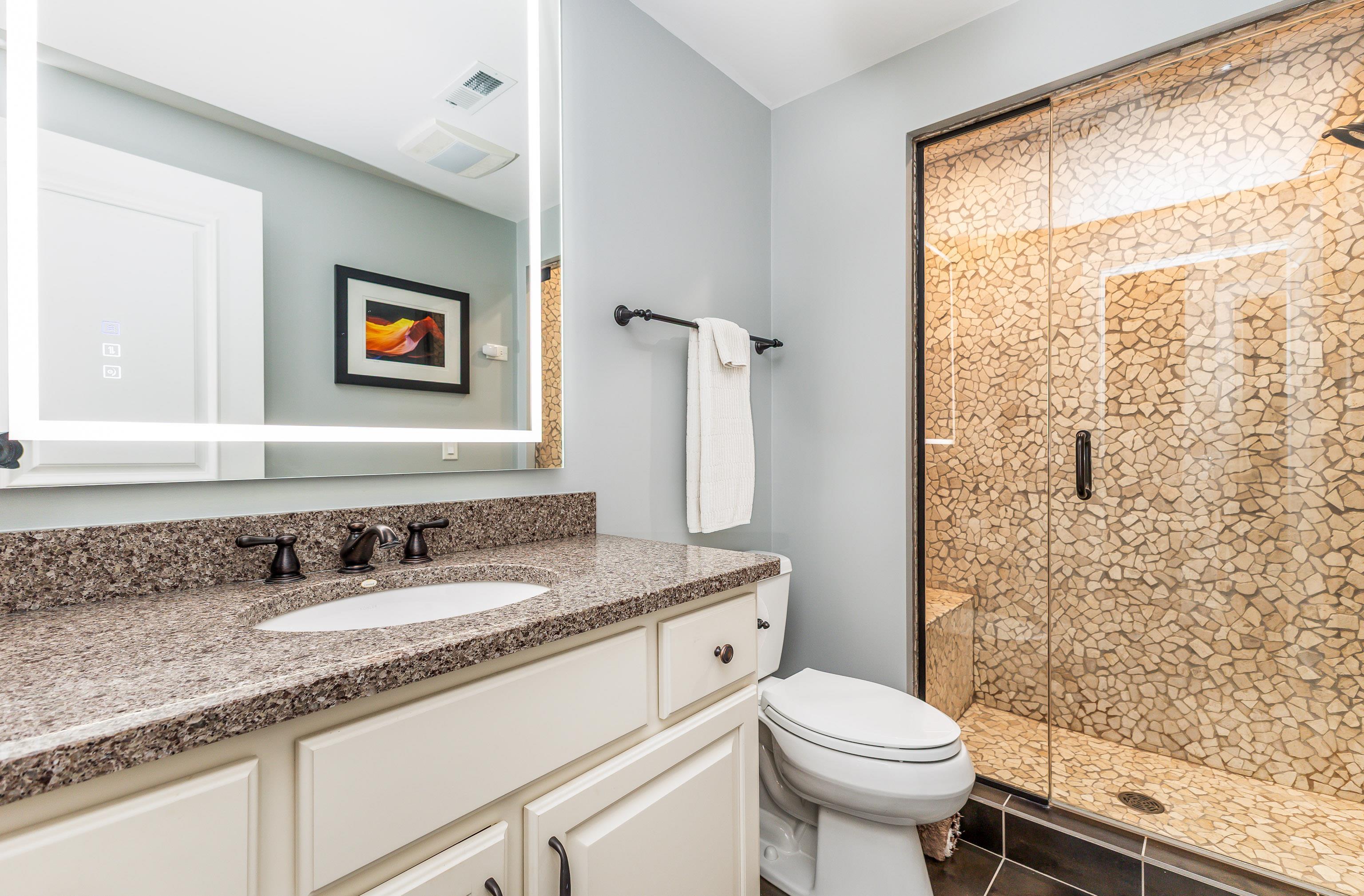 6 Hickory Trail Galena, IL 61036 - Photo 52 of 67 a bathroom with a sink toilet and shower