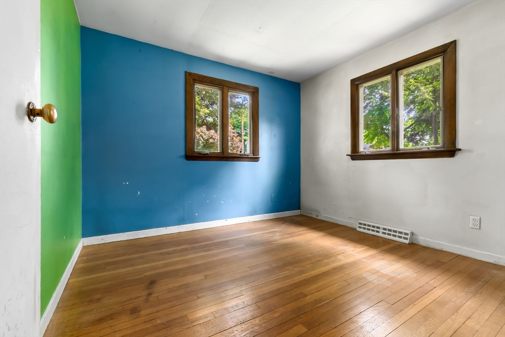 71 Union Street Hamilton, MA 01982 - Photo 12 of 21 a view of an empty room with window and hardwood floor