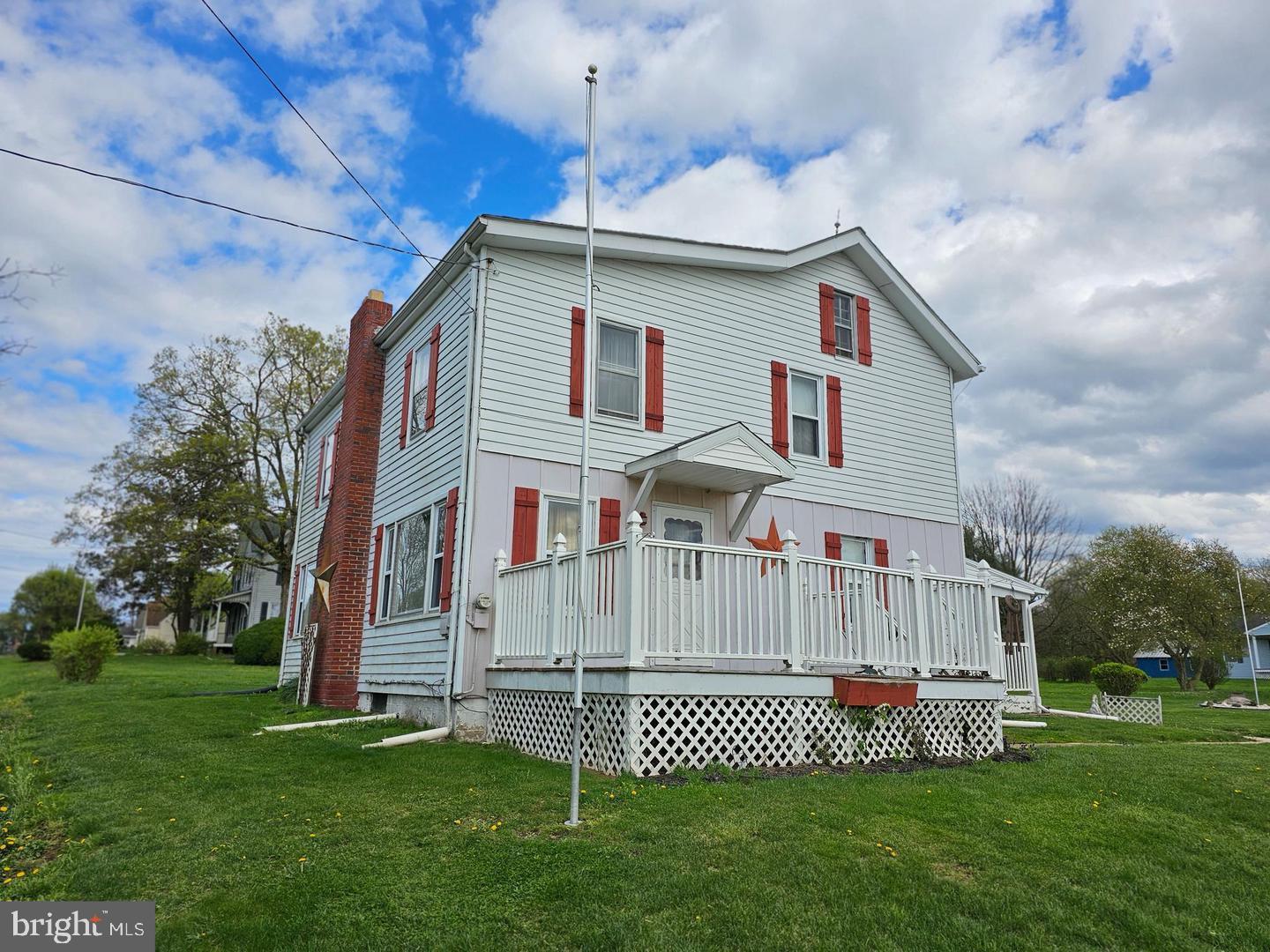 271 England Creamery Road North East, MD 21901 - Photo 3 of 14 a front view of a house with a garden