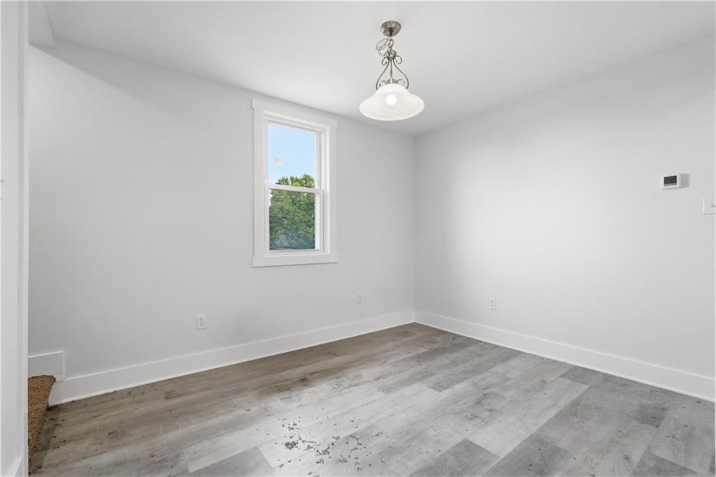 480 Songo Street Pittsburgh, PA 15227 - Photo 12 of 36 wooden floor in an empty room