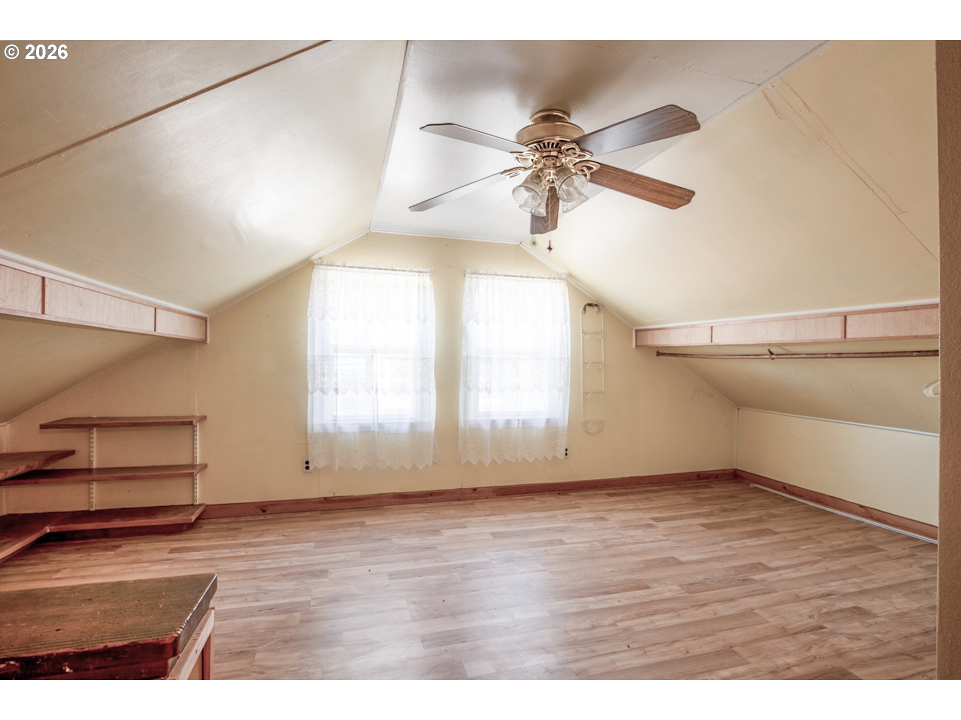47433 School Street Oakridge, OR 97463 - Photo 10 of 16 a view of an empty room with a window and wooden floor