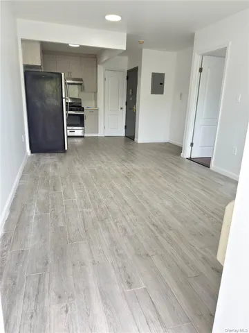 a view of city from balcony with seating space