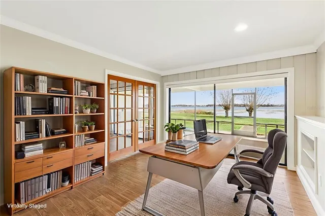 a reading room with furniture and a book shelf