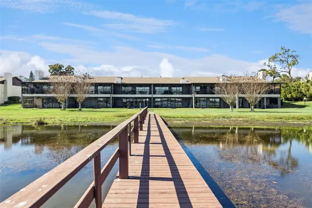 a view of swimming pool with a lake view