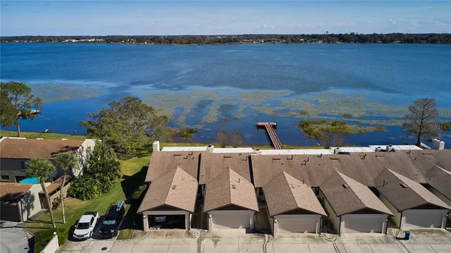 an aerial view of a houses with outdoor space