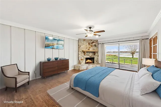 a bed room with a bed and a chandelier