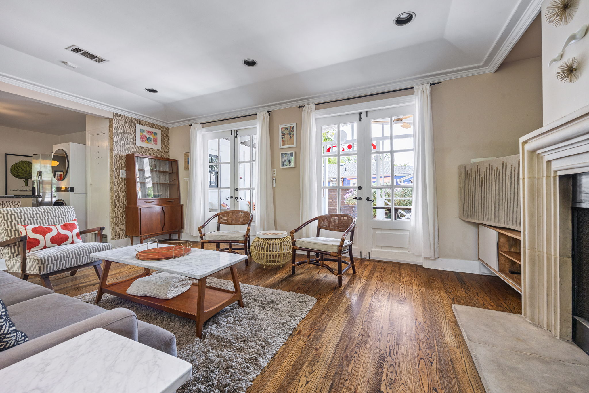 305 East 50th Street Austin, TX 78751 - Photo 16 of 40 a living room with furniture and a fireplace