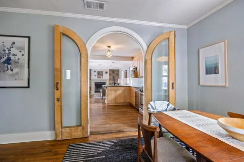 a view of a livingroom with furniture and wooden floor