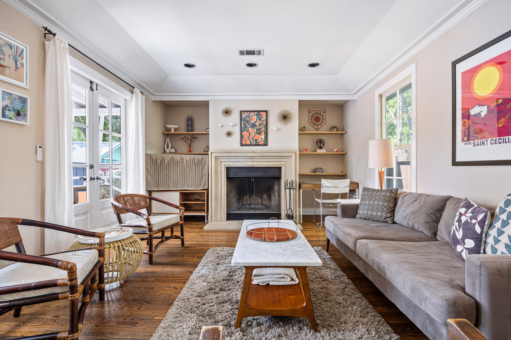 305 East 50th Street Austin, TX 78751 - Photo 10 of 40 a living room with furniture and a fireplace