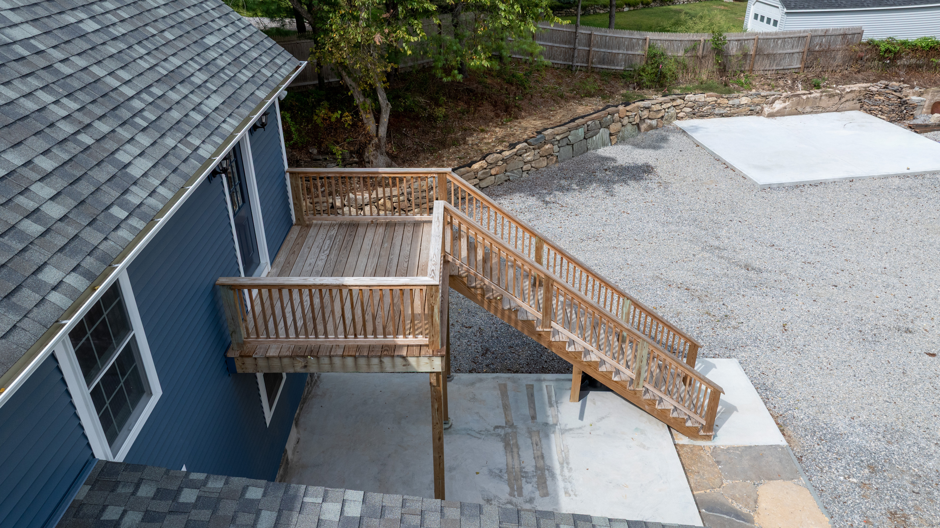 60 Goose Hill Road Chester, CT 06412 - Photo 17 of 35 a balcony with wooden floor and lake view