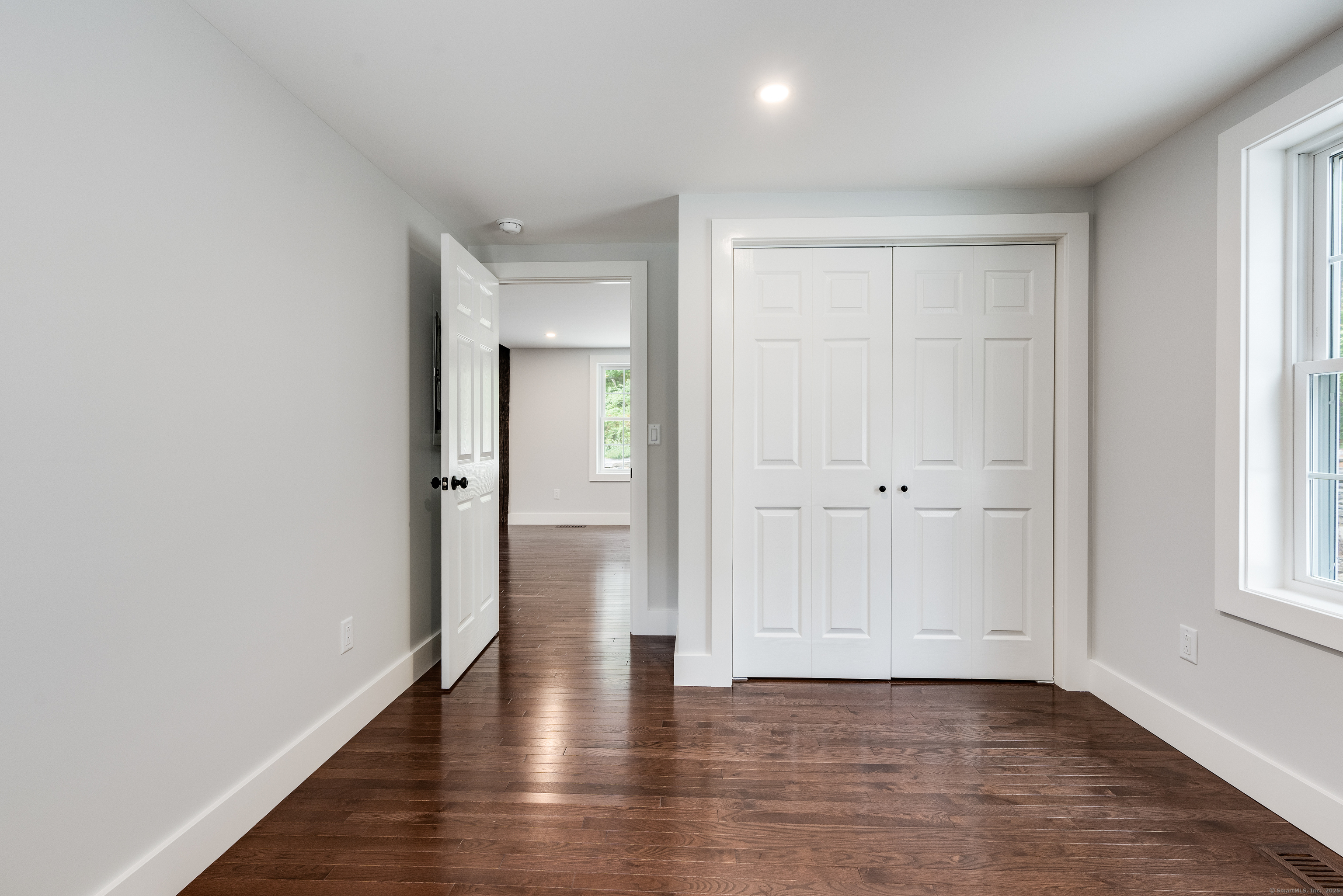 60 Goose Hill Road Chester, CT 06412 - Photo 20 of 35 a view of an empty room with wooden floor