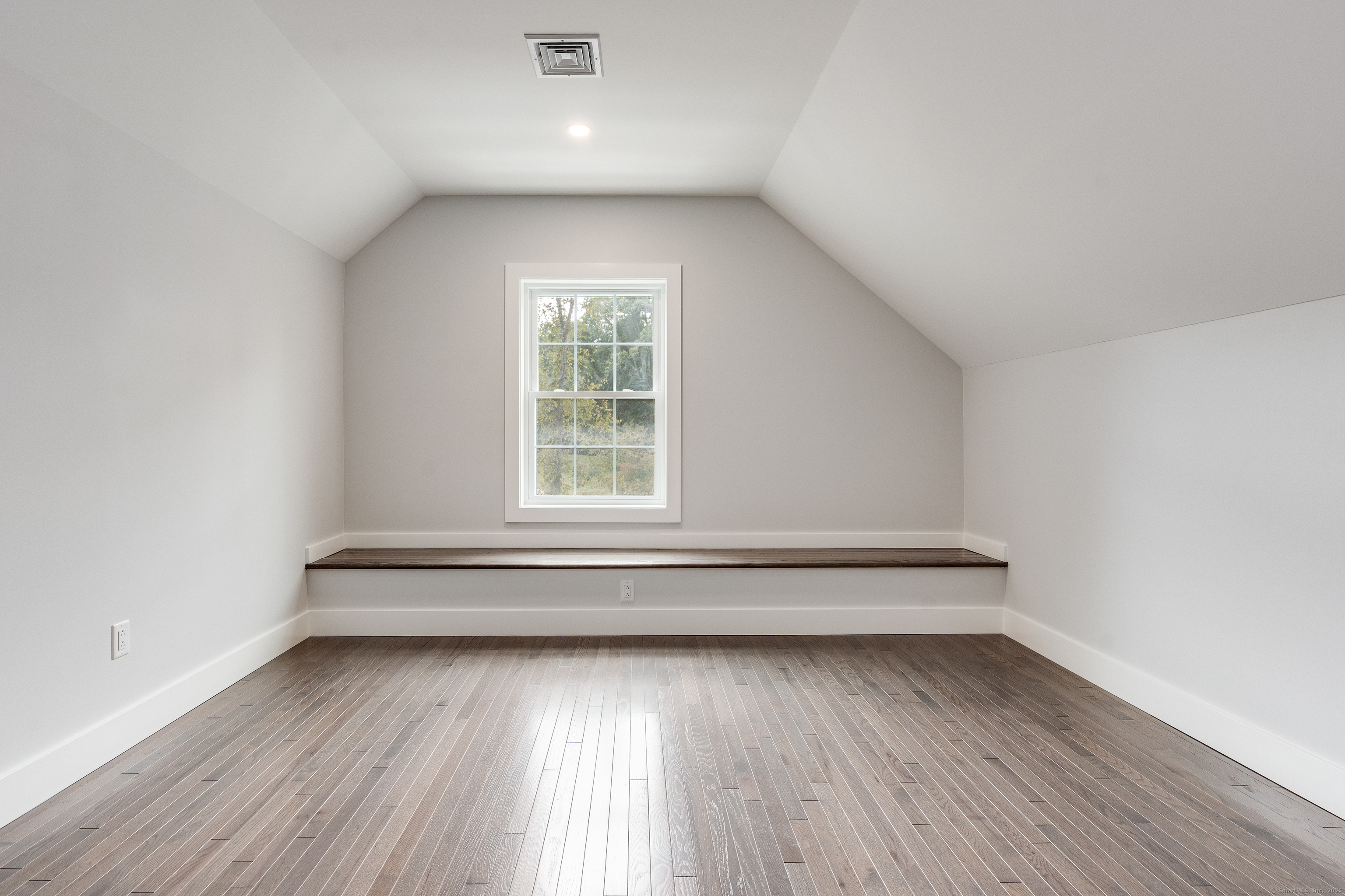 60 Goose Hill Road Chester, CT 06412 - Photo 27 of 35 an empty room with wooden floor and windows