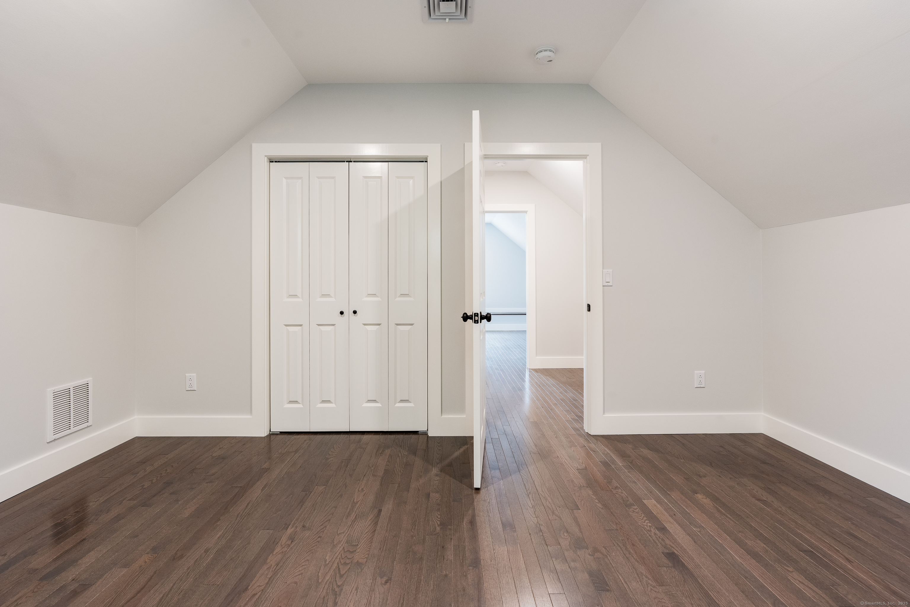 60 Goose Hill Road Chester, CT 06412 - Photo 29 of 35 a view of an empty room with wooden floor