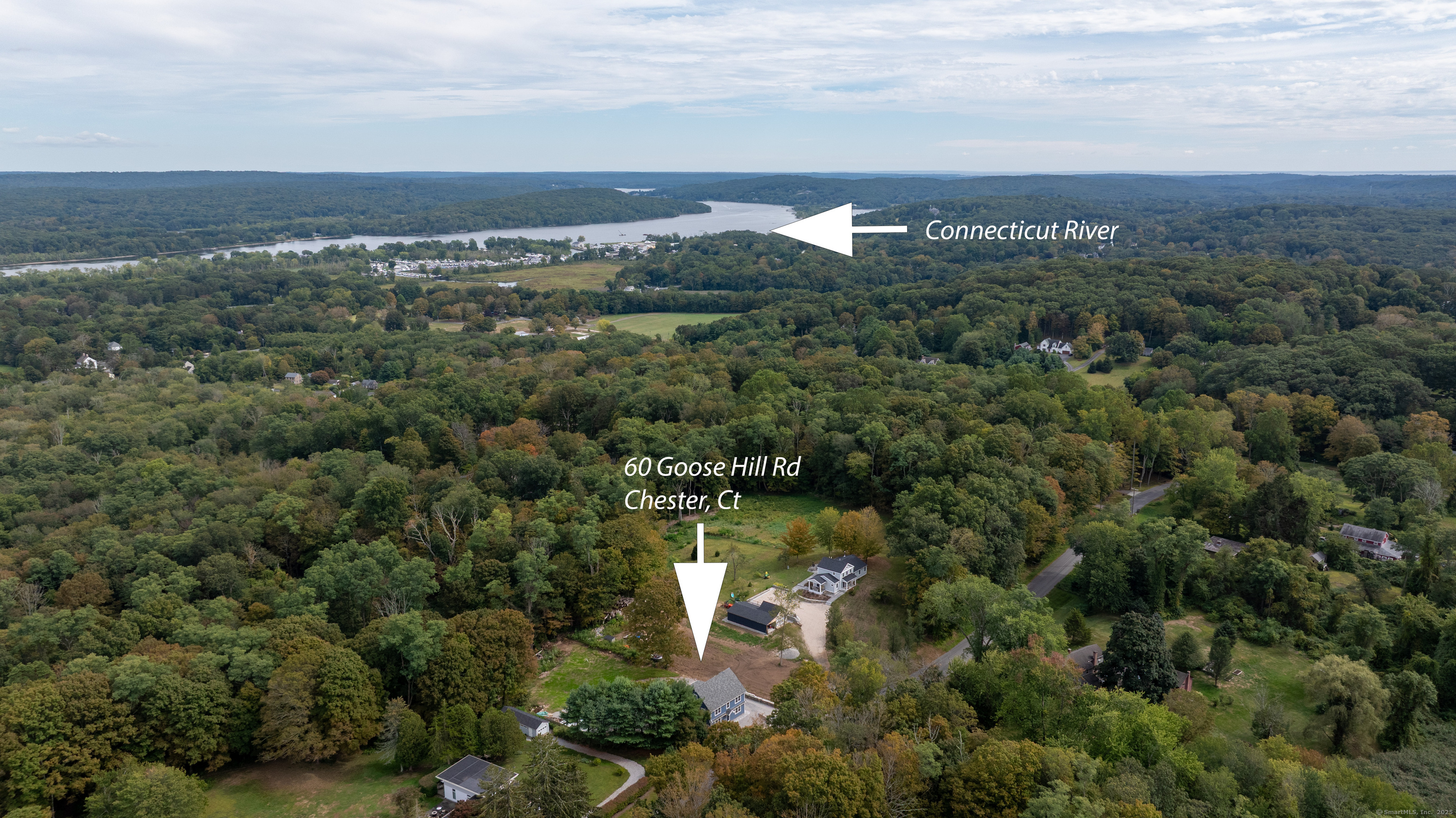 60 Goose Hill Road Chester, CT 06412 - Photo 3 of 35 an aerial view of a city