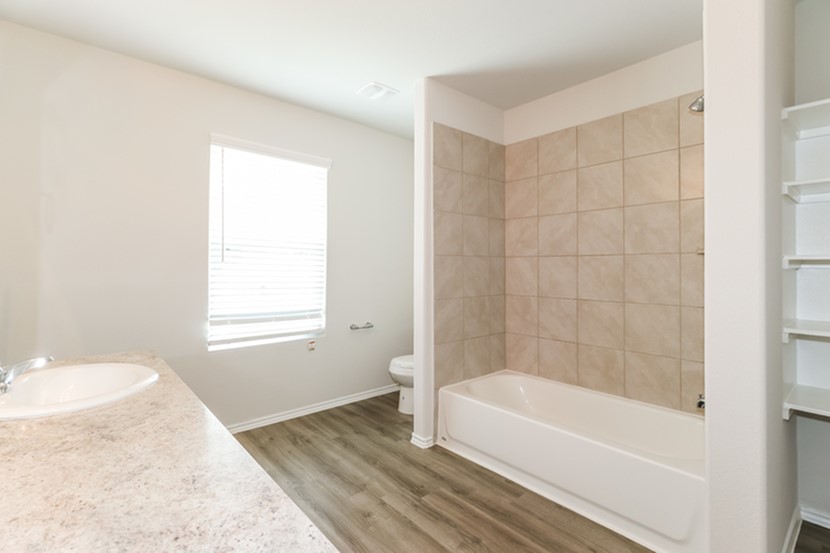 2743 Madison Court Conroe, TX 77304 - Photo 13 of 15 Photos may be representative of the floor plan and not the exact home. Finishes, layout, and features of the actual property for lease may vary.