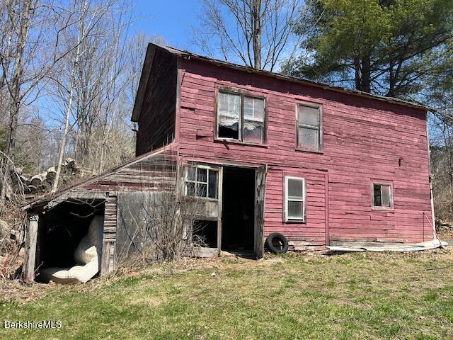 17 Swamp Road West Stockbridge, MA 01266 - Photo 20 of 25 a front view of a house with a yard