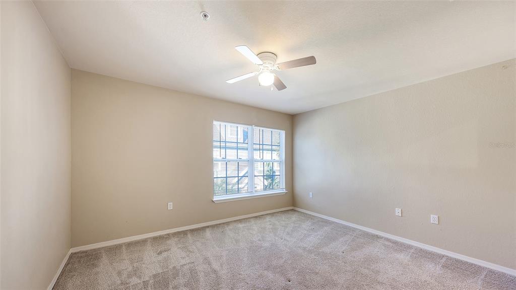 5520 Rosehill Road, Unit 203 Sarasota, FL 34233 - Photo 15 of 46 a view of an empty room with a window