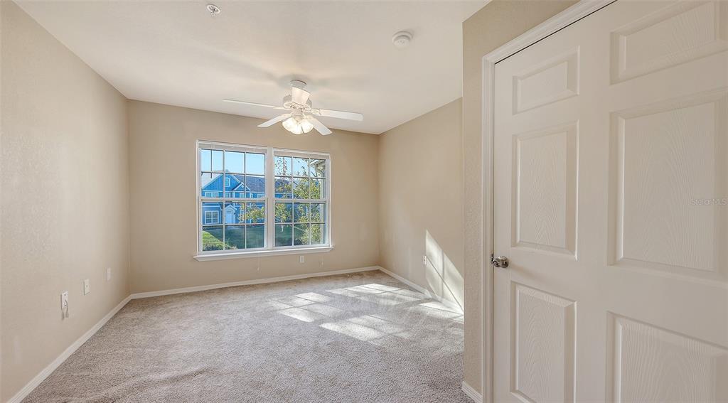5520 Rosehill Road, Unit 203 Sarasota, FL 34233 - Photo 25 of 46 a view of an empty room with a window