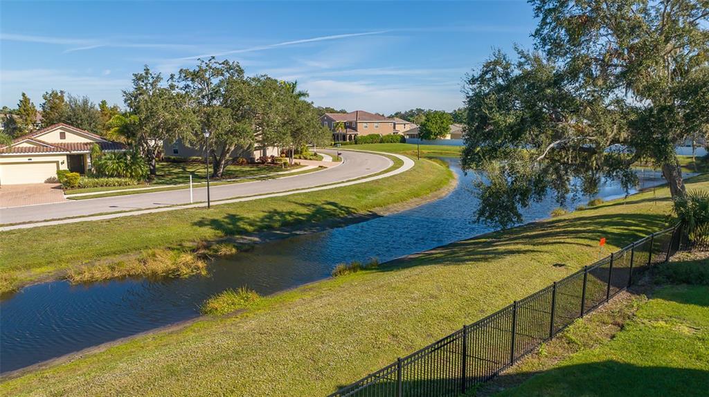 5520 Rosehill Road, Unit 203 Sarasota, FL 34233 - Photo 44 of 46 a view of a swimming pool with a yard