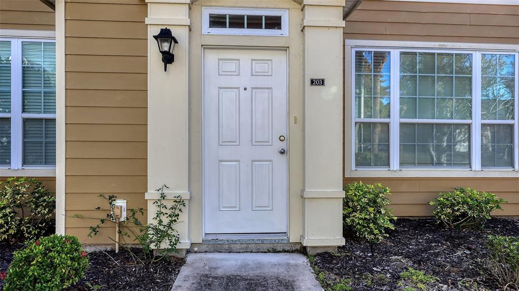 5520 Rosehill Road, Unit 203 Sarasota, FL 34233 - Photo 5 of 46 a view of entrance door of the house