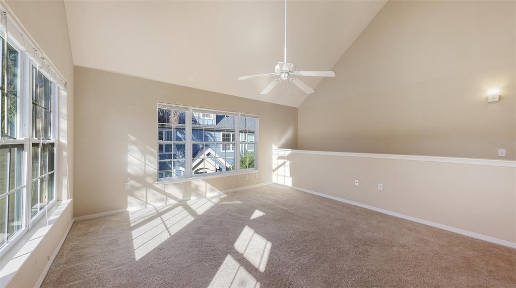 5520 Rosehill Road, Unit 203 Sarasota, FL 34233 - Photo 10 of 46 a view of an empty room with a window