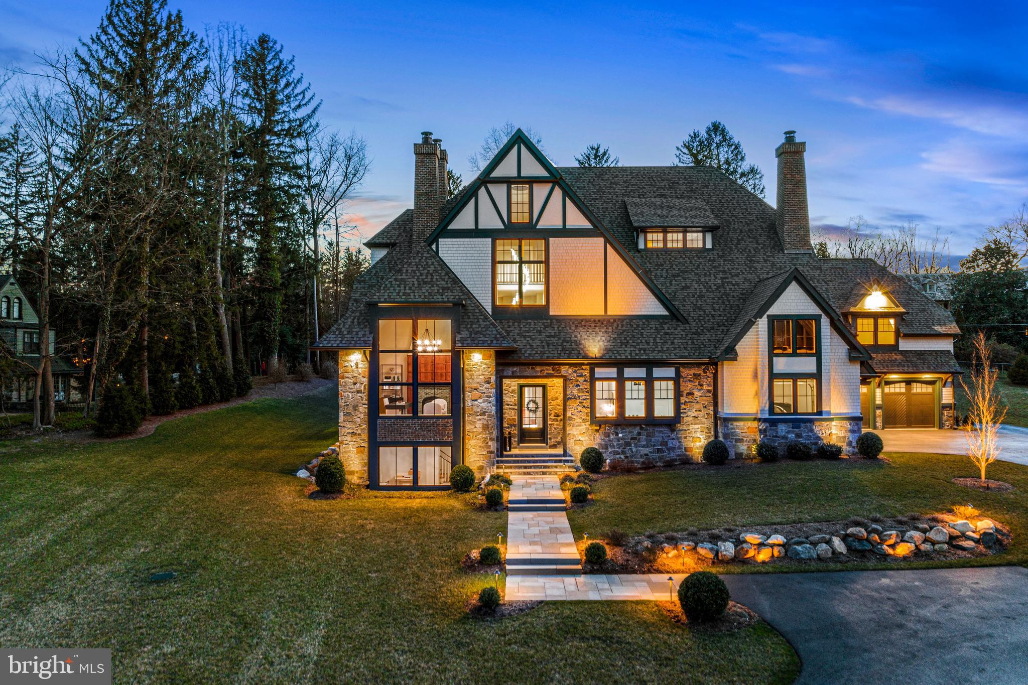 10 Tunbridge Road Haverford, PA 19041 - Photo 3 of 3 a front view of a house with a yard