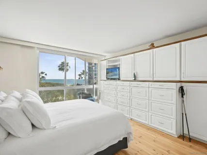 a bed room with a bed and a window
