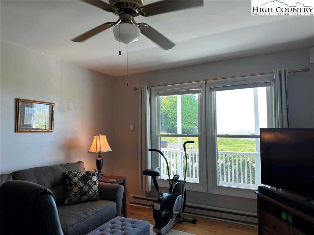 4952 Nile Road Sparta, NC 28675 - Photo 17 of 36 a living room with furniture tv and a window