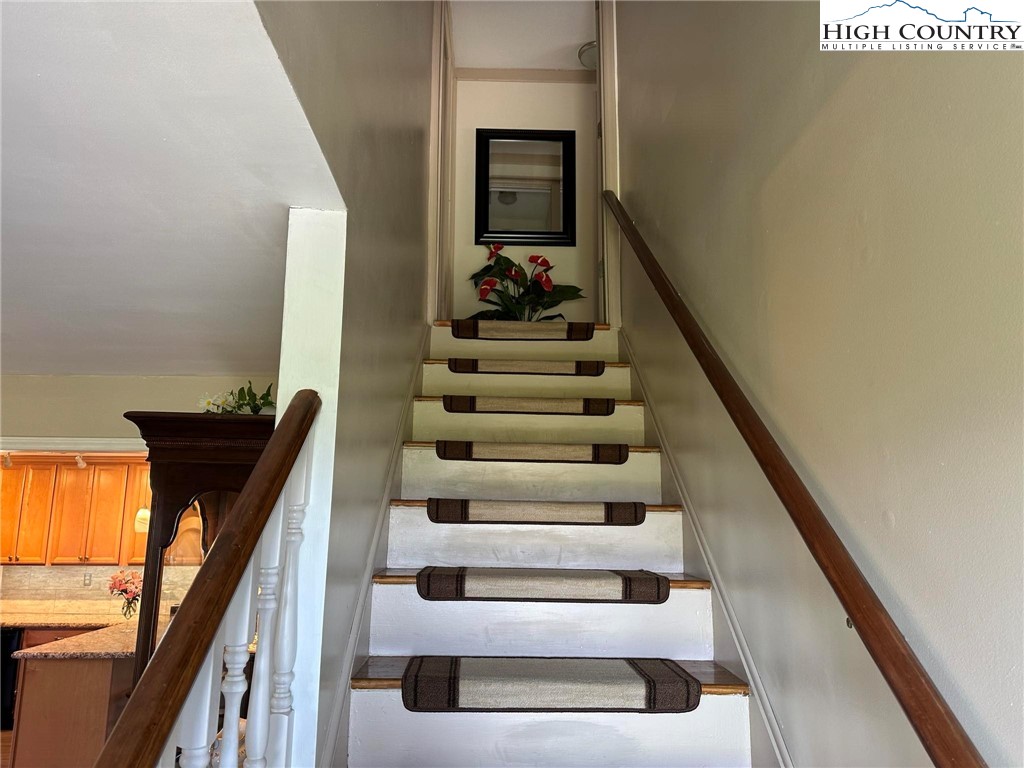 4952 Nile Road Sparta, NC 28675 - Photo 25 of 36 a view of entryway and hall with wooden floor