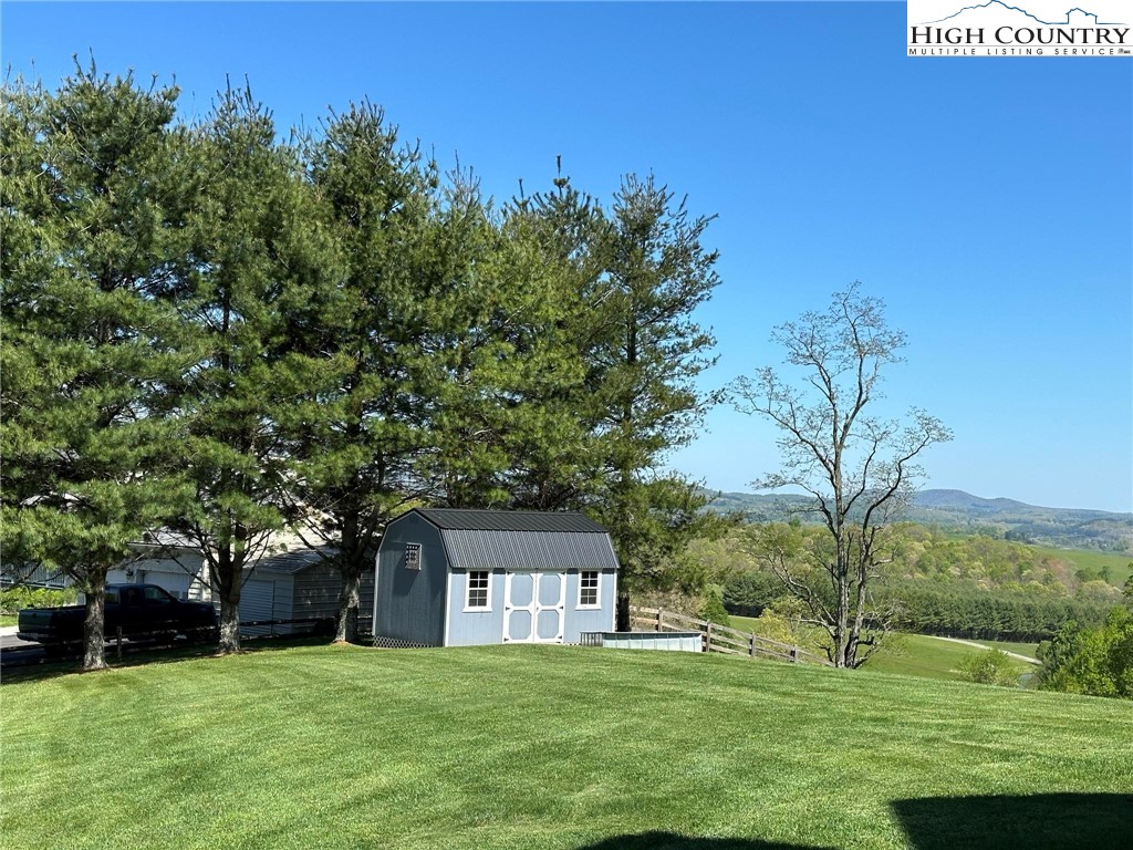 4952 Nile Road Sparta, NC 28675 - Photo 35 of 36 a house view with a sitting space and garden