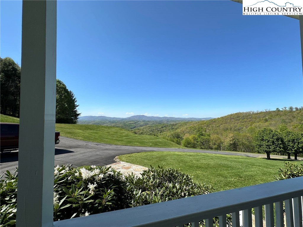 4952 Nile Road Sparta, NC 28675 - Photo 5 of 36 a view of a lake with a mountain in the background